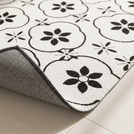 Tapis Cuisine noir et blanc floral lavable